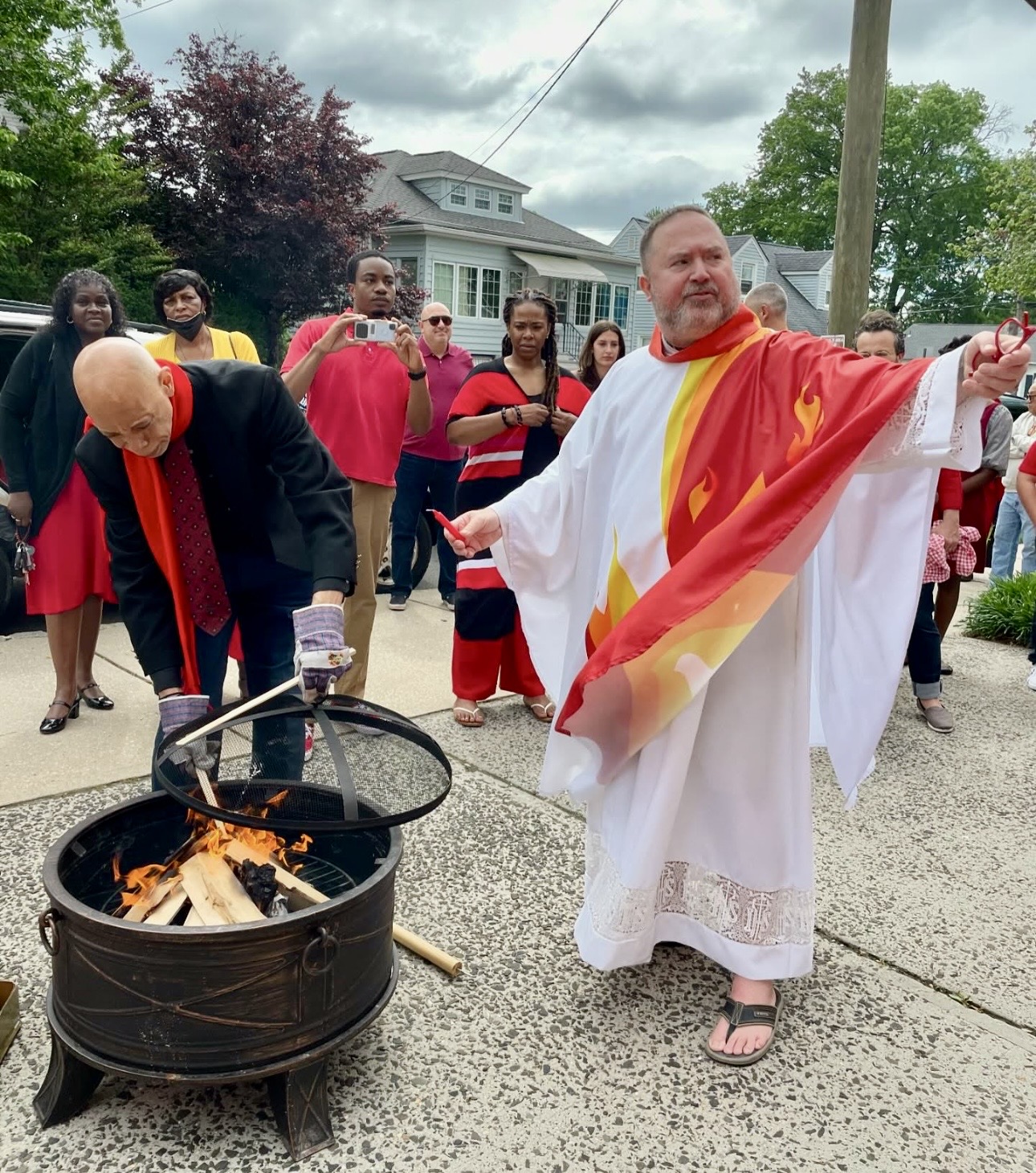 Fr. Jim blessing the Easter Vigil fire outside the church
